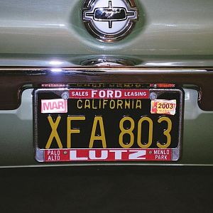 origianl license plate from day one with the dealer name frame, also have a dealer frame up front