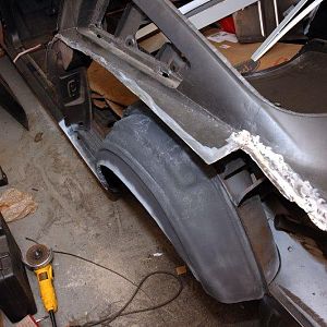 Left Side Quarter - patched and sanded wheelhouse