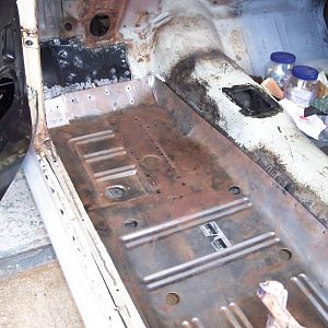 8/1/16 Drilled all the spot weld holes in the l/s long floor & reworked the front section that overlaps the toe board for a better fit.