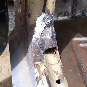8/10/16 Welded in patch l/s lower rear of l/s door post.