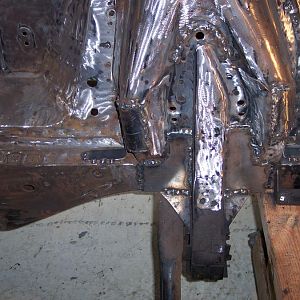 10/5/16 Welded on the l/s center rear & started welding on the "L" shaped shock tower to frame reinforcements.