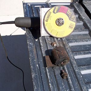 3/17/17 Installed a 7" metal cutting disc on my angle grinder & made a new shield out of a left over piece of sheet metal. R/S front spring eyelet & p