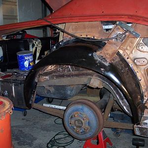 Welded in the r/s outer wheel house support & started welding the outer wheel house.