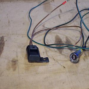 12/23/17 Modifying the wiring of the dash e-brake warning light to work with the center mount hand brake.