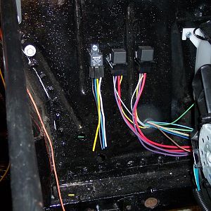 1/12/18 I drilled a 7/8" hole in the lower part of the l/s front inner fender panel & ran the harness back into the engine compartment & through the h