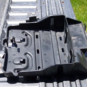 6/16/18 Plastic charcoal canister bracket from a 2000 Explorer.